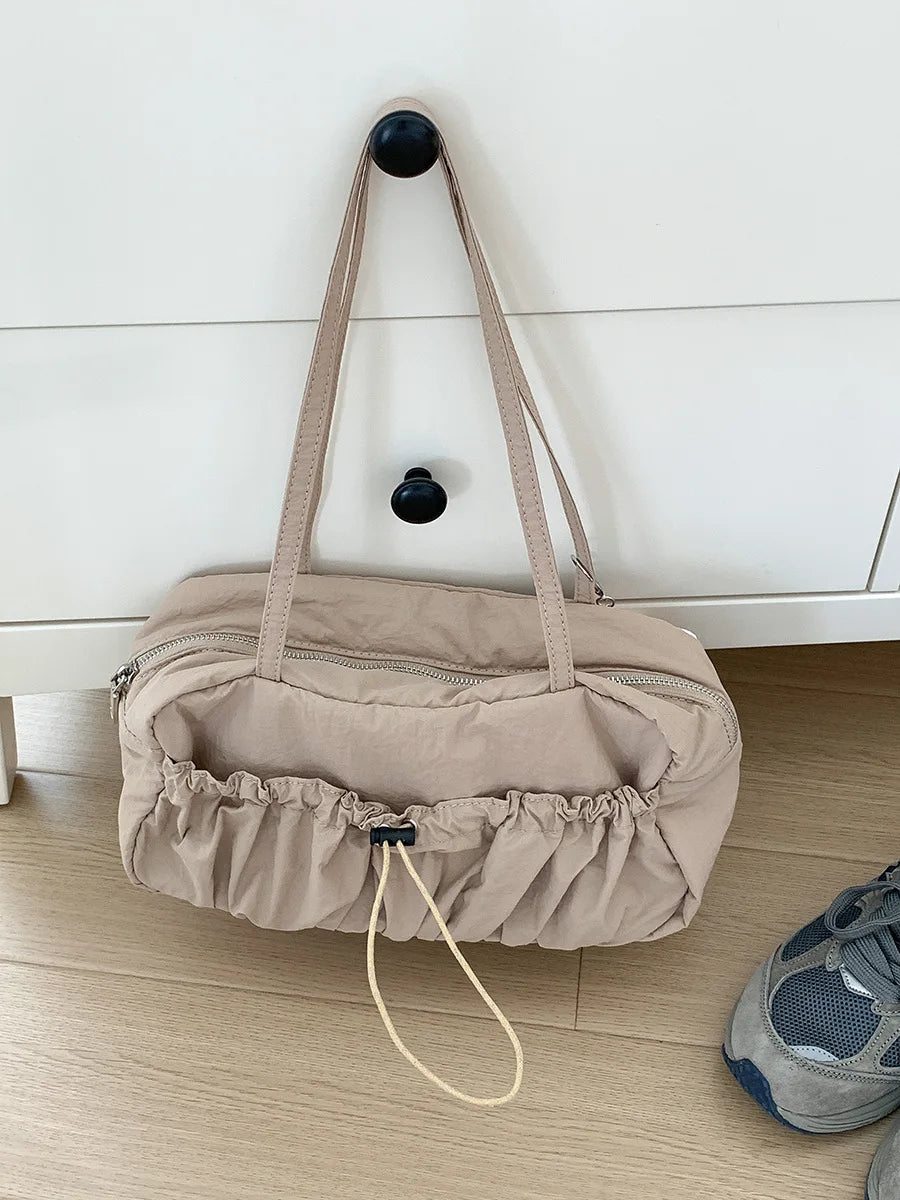 A Niche Commuting Single Shoulder Tote Bag with Pleats Luxurious Underarm Bag for Women Temperament High Capacity Nylon Handbag