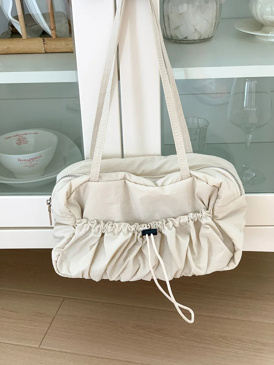 A Niche Commuting Single Shoulder Tote Bag with Pleats Luxurious Underarm Bag for Women Temperament High Capacity Nylon Handbag